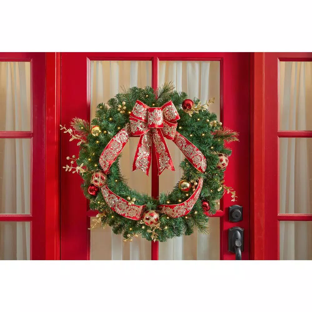 Home Accents Holiday 30 in Royal Easton Battery Operated Pine LED Pre-Lit Artificial Wreath with Timer