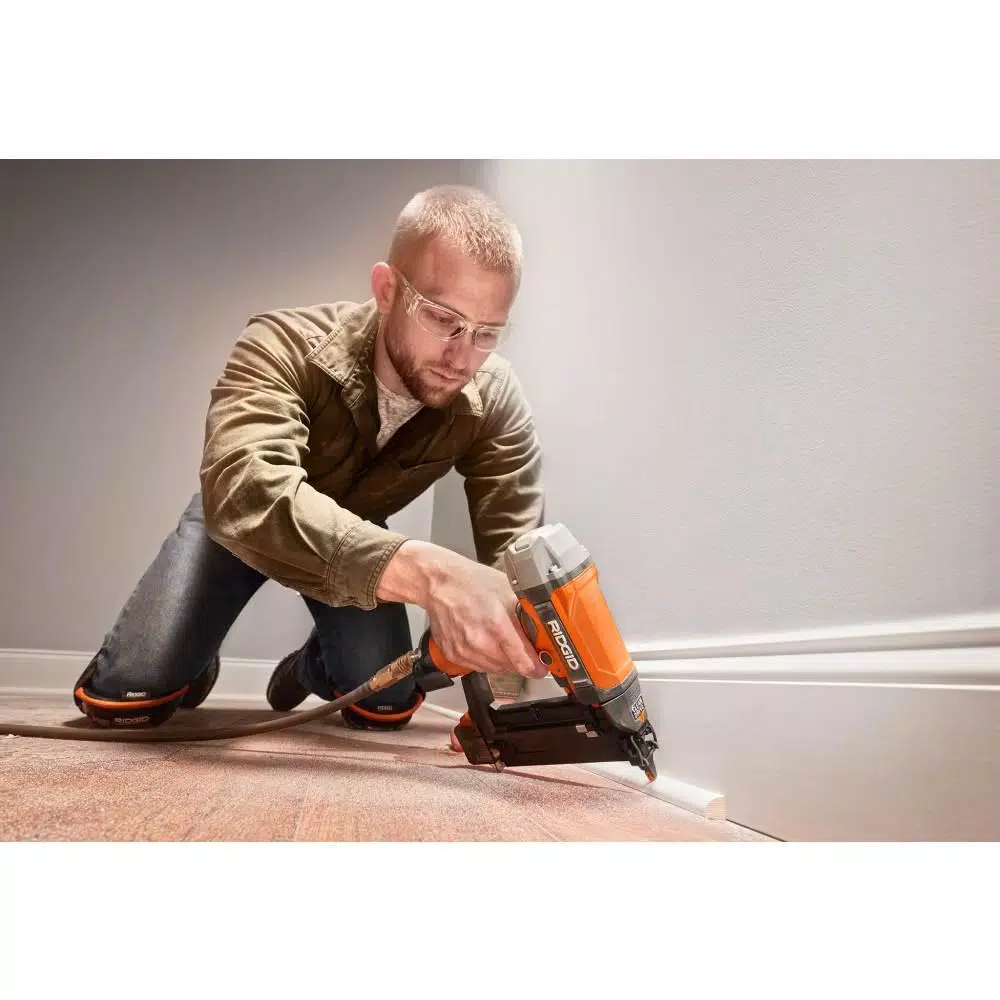 RIDGID 18-Gauge 2-1/8 in. Brad Nailer w/ CLEAN DRIVE Technology, Tool Bag, and Sample Nails w/ 1/4 in. 50 ft. Lay Flat Air Hose