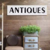 Pinnacle 10 in. x 36 in. Rustic Antiques White Metal Wall Sign